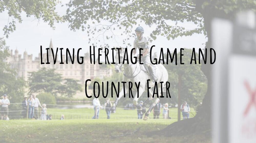 A lively outdoor scene at the Living Heritage Game and Country Fair, featuring traditional games, country displays, and visitors exploring various booths and activities.